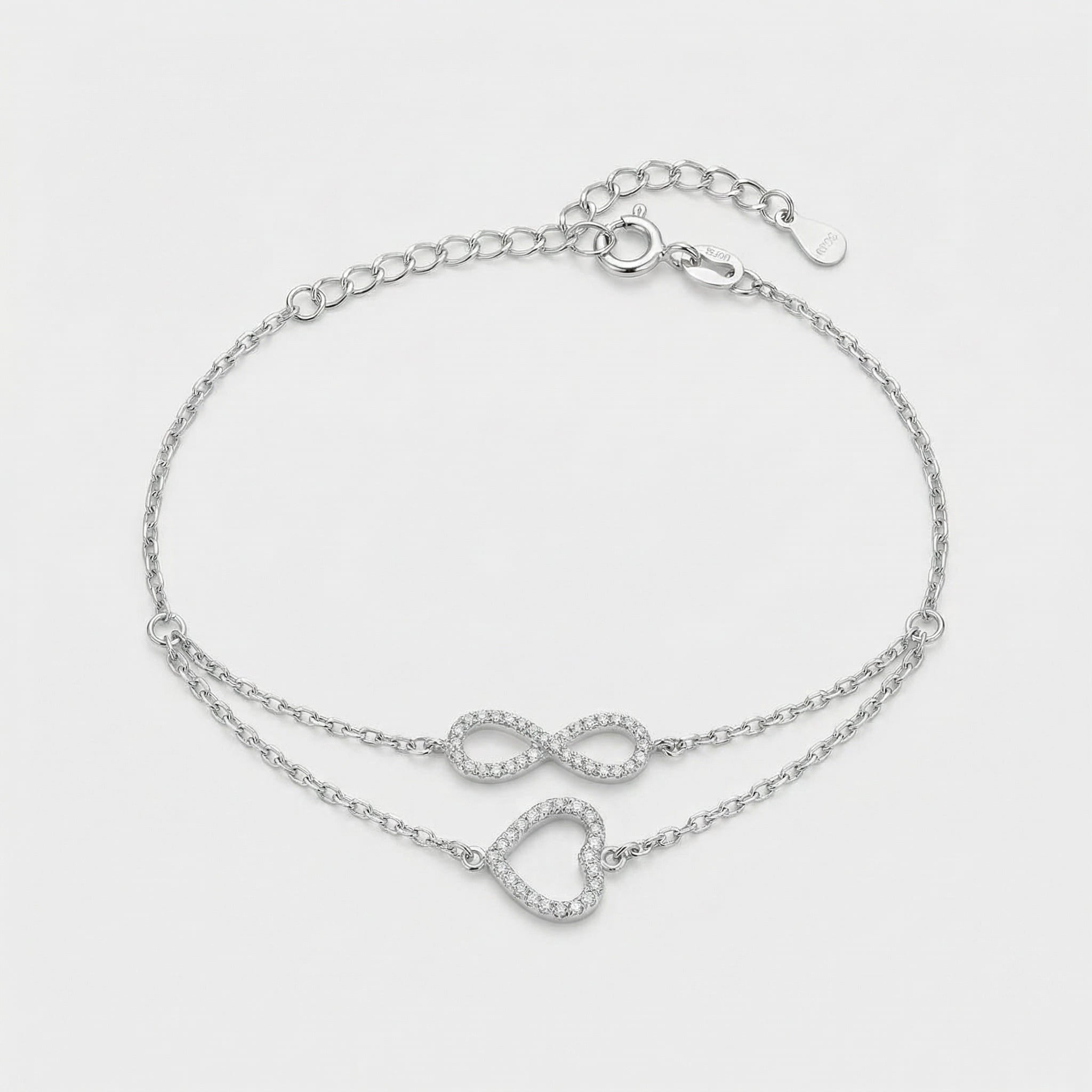 PULSEIRA DUPLA CORAÇÃO + INFINITO AMBOS CRAVEJADOS