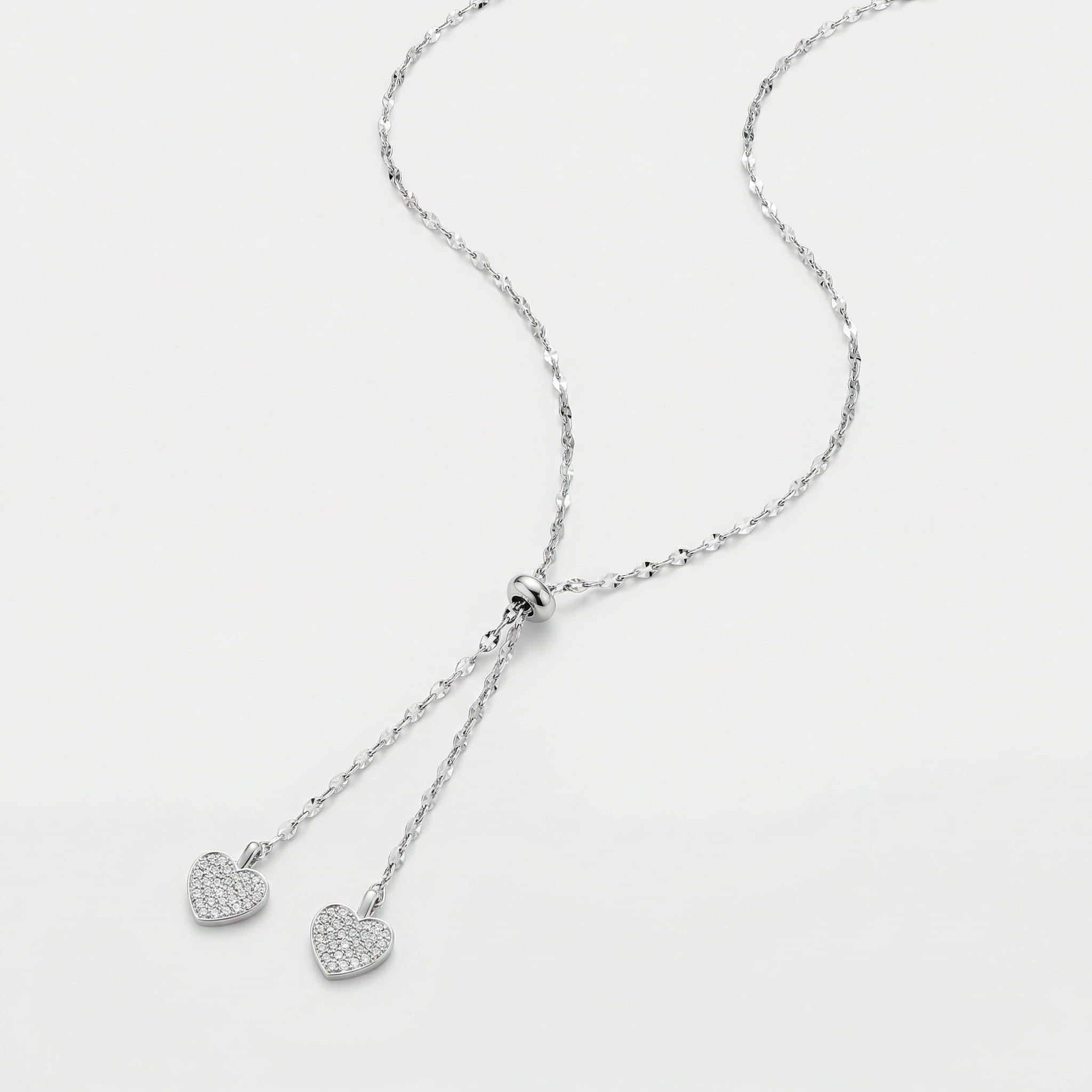 COLAR GRAVATA ARGOLA COM SILICONE COM DOIS CORAÇÕES CRAVEJADOS