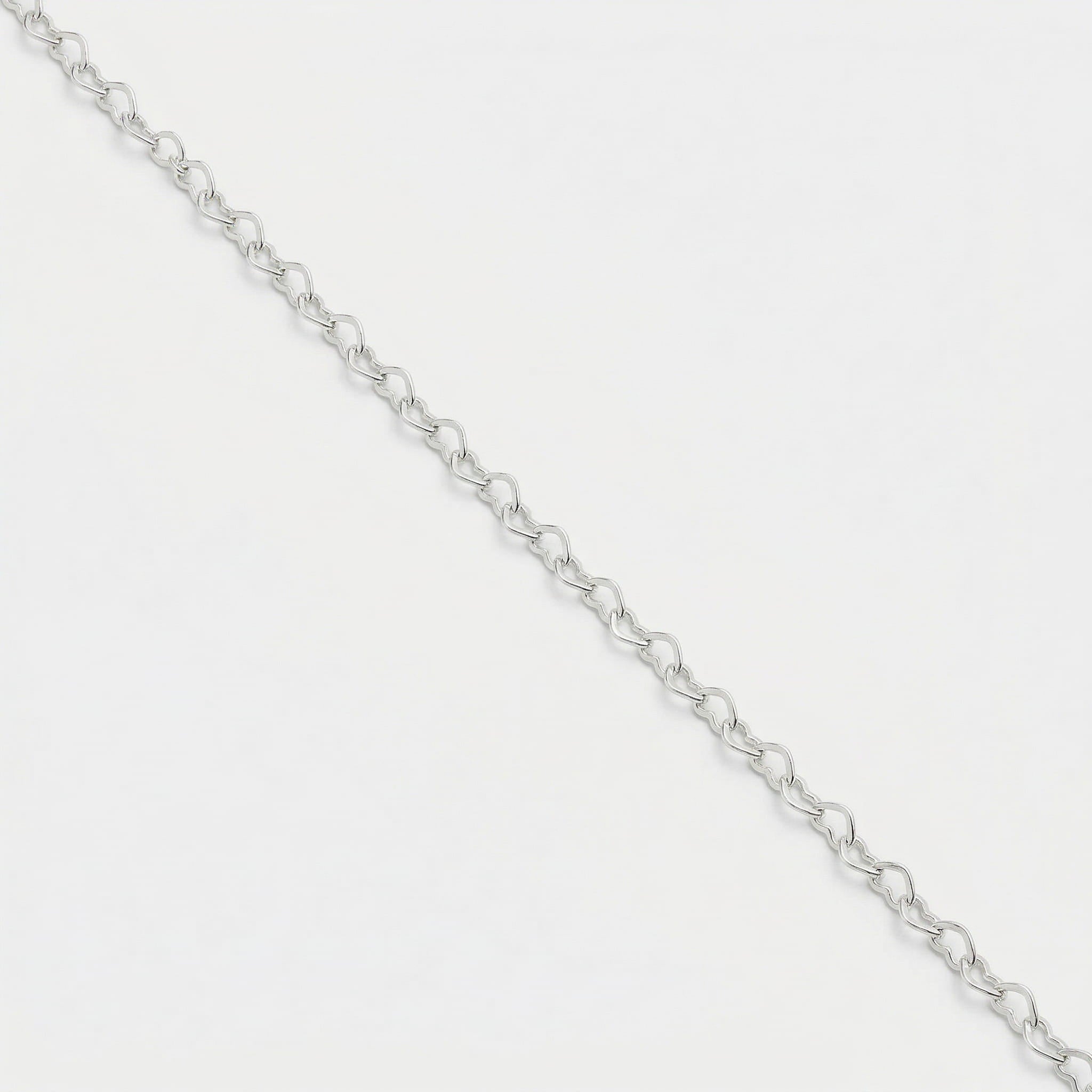 PULSEIRA CORAÇÕES ENTRELAÇADOS FIO 045