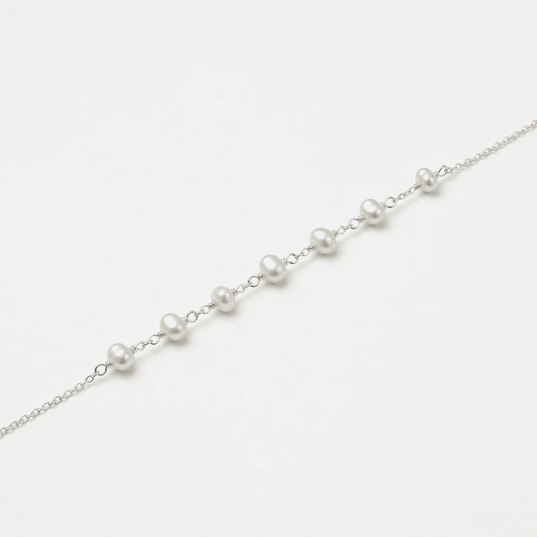 PULSEIRA  COM 7 PÉROLAS P