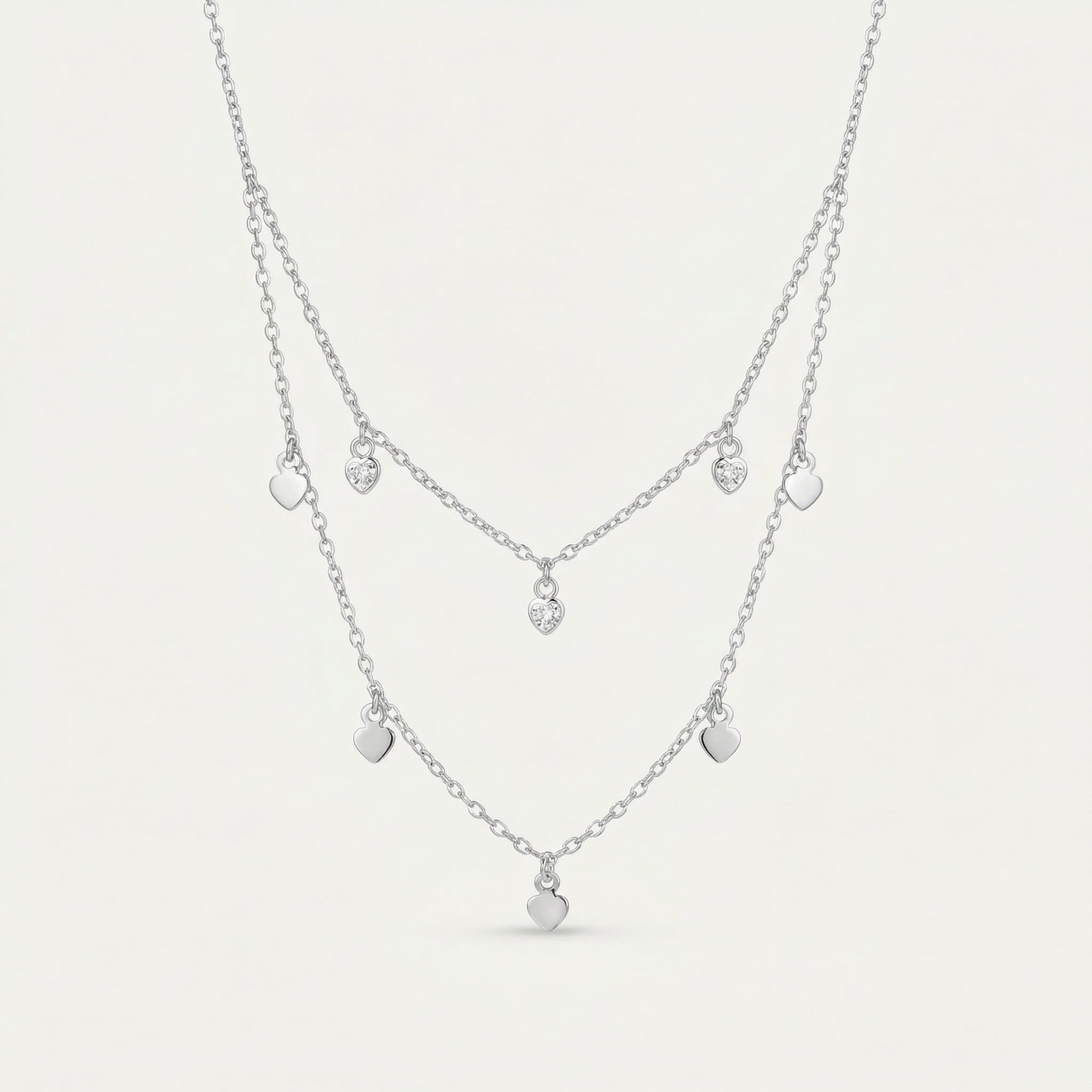 CHOKER DUPLO CORAÇÃO CHAPADO E CORAÇÃO COM PEDRA