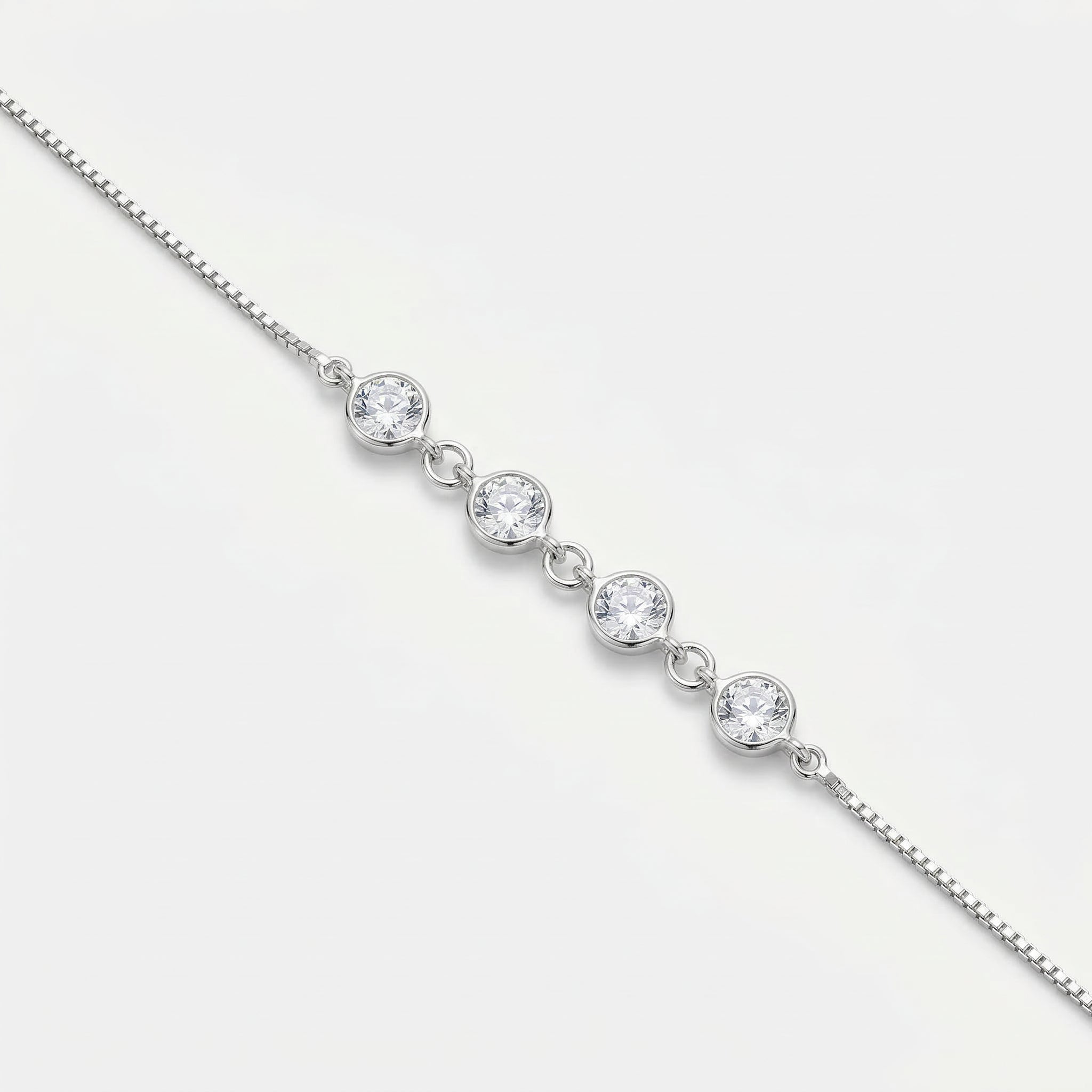 PULSEIRA COM 4 PEDRAS REDONDAS
